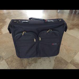 Delsey rolling Suiter luggage